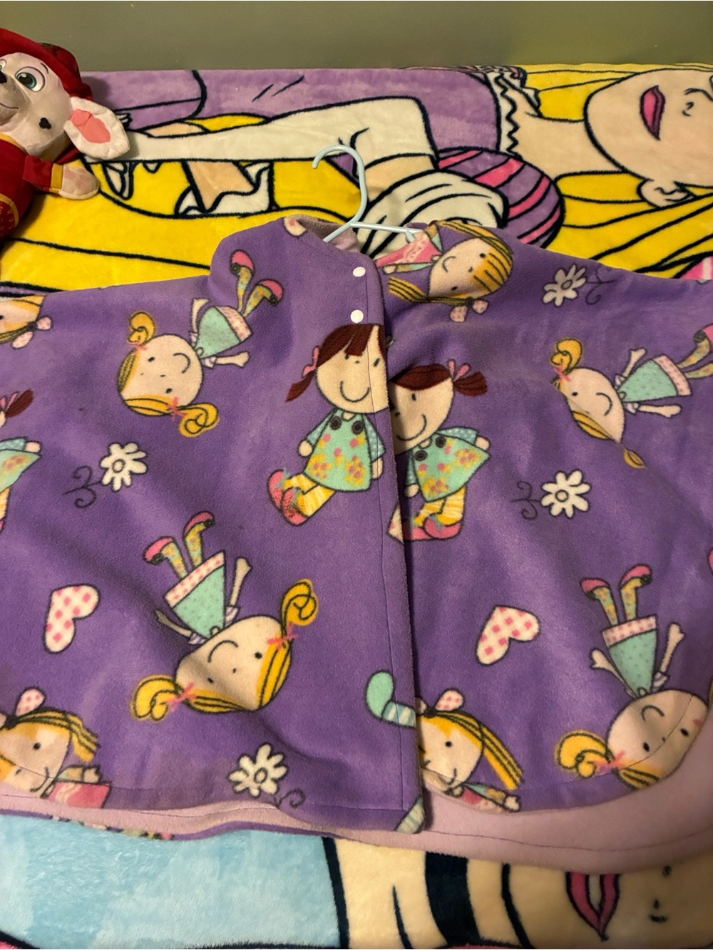 Girls' Purple Fleece Poncho with Playful Doll Print